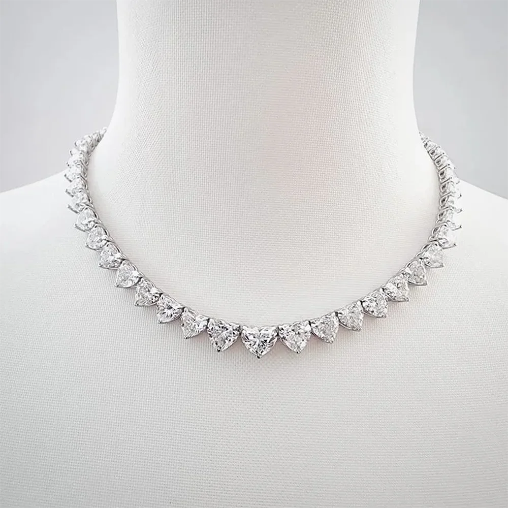 Heart cut moissanite necklace
Moissanite drop earrings
D color VVS1 moissanite jewelry
925 sterling silver heart earrings
Luxury Valentine’s Day earrings
Moissanite bridal earrings
Statement earrings with sparkle
Ethical diamond alternative jewelry
Moissanite fine jewelry Symi Jewel