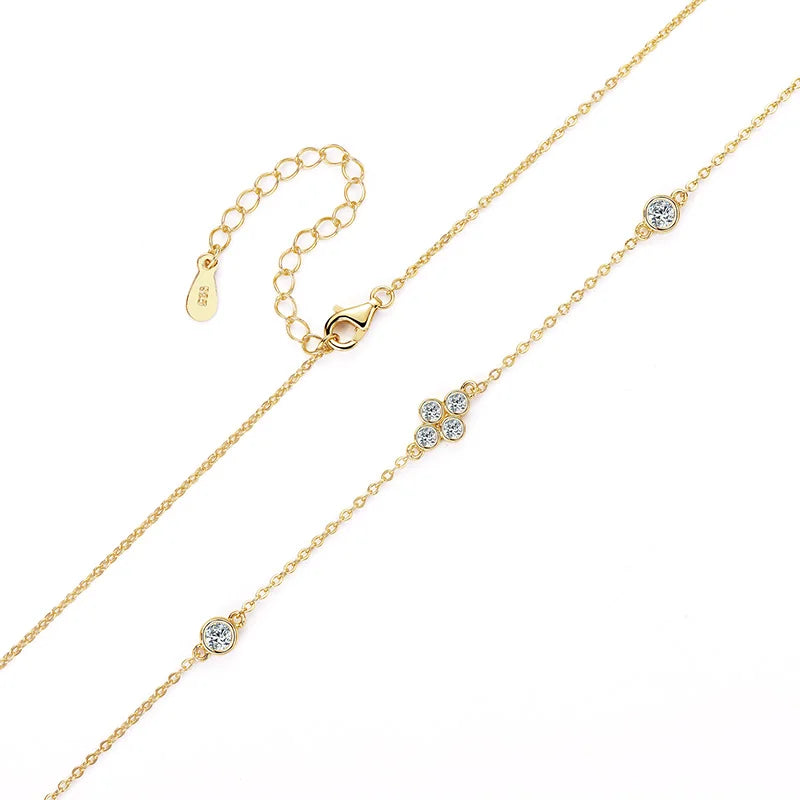 Moissanite choker necklace
D color moissanite
925 sterling silver dainty necklace
Symi Jewel moissanite jewelry
Affordable diamond alternative
Layered charm necklace
Everyday luxury necklace