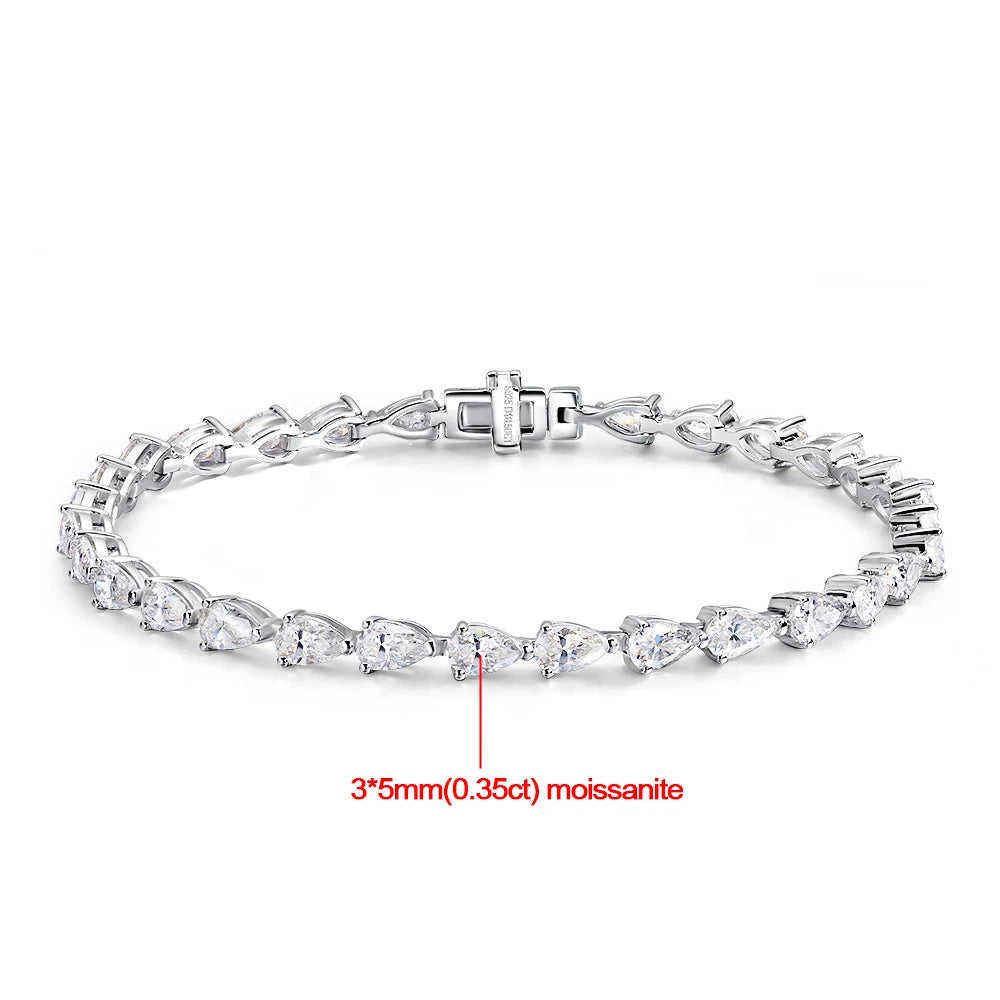 Close-up of 3x5mm pear cut Moissanite stones in a silver setting
pear cut Moissanite tennis bracelet
GRA certified moissanite bracelet
white gold moissanite bracelet for women
luxury moissanite jewelry USA
D color 925 silver bracelet
dainty moissanite tennis bracelet
pear shaped diamond alternative bracelet
Symi Jewel tennis bracelet